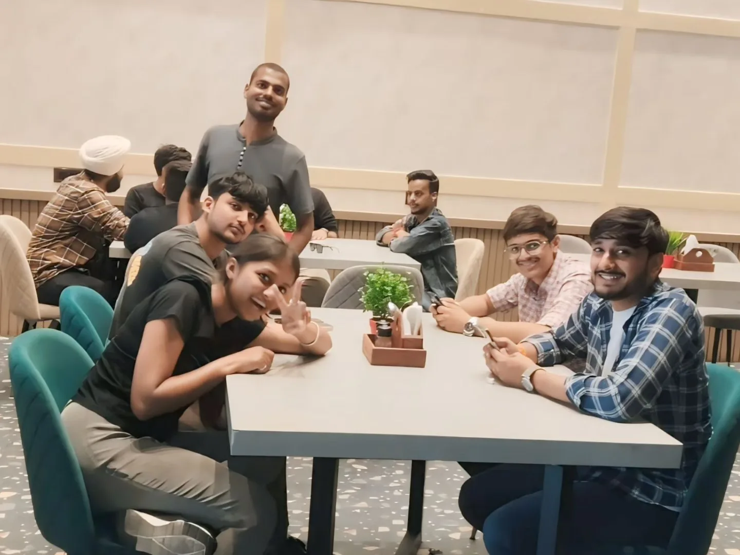 A team sharing a relaxed table together