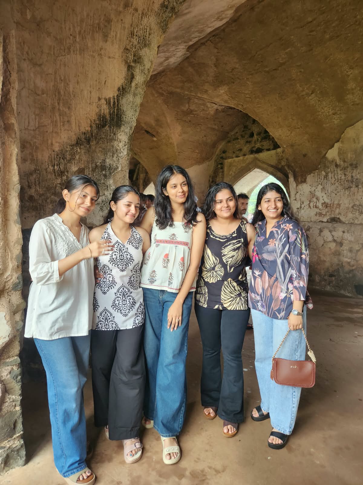 FUN TOUR friends posing together during a Mandav heritage outing